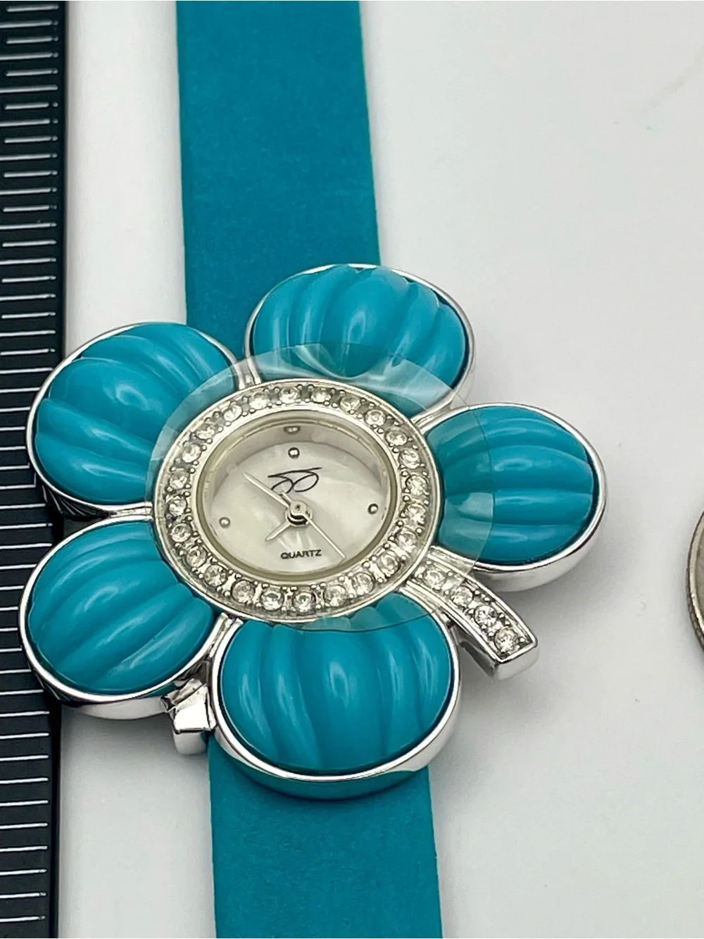 Suzanne Somers Turquoise Flower Watch with Rhinestone Bezel. Blue Leather Band